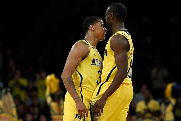 Trey Burke (3) and Tim Hardaway Jr. (10)
