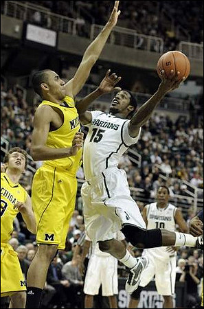 Jon Horford (15) and Zack Novak (0)