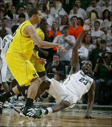 Jordan Morgan (52) and Tim Hardaway Jr. (10)