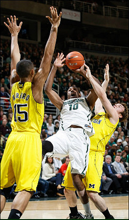 Jon Horford (15) and Zack Novak (0)