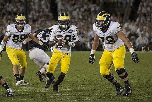 Jake Butt (88), Devin Gardner (98), and Erik Magnuson (78)