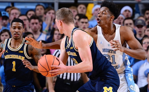 Charles Matthews (1) and Moritz Wagner (13)