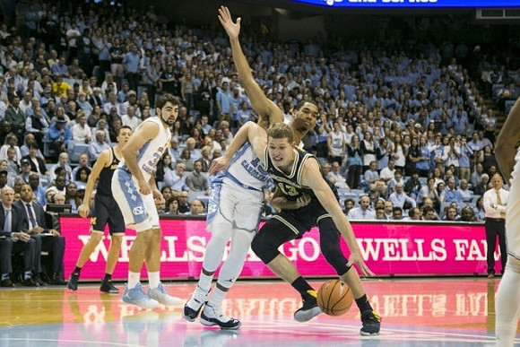 Duncan Robinson (22) and Moritz Wagner (13)