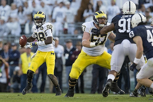 Devin Gardner (98) and Kyle Kalis (67)