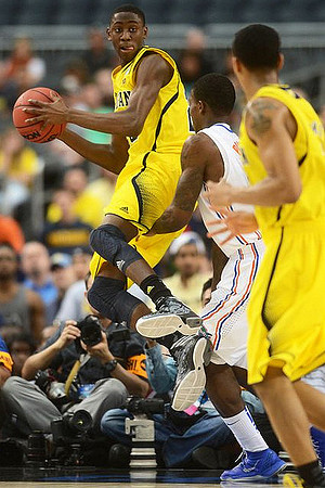 Caris LeVert (23) and Trey Burke (3)