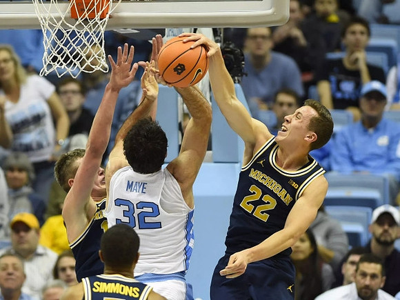 Jaaron Simmons (5), Moritz Wagner (13), and Duncan Robinson (22)