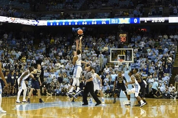 Duncan Robinson (22) and Muhammad-Ali Abdur-Rahkman (12)