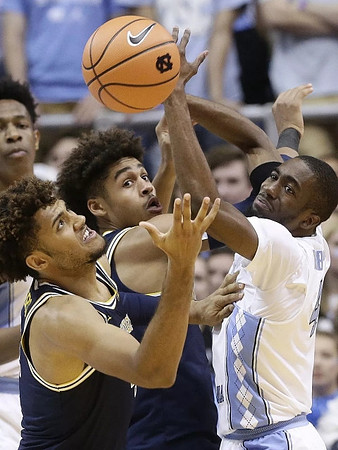 Isaiah Livers (4) and Jordan Poole (2)