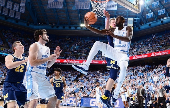Duncan Robinson (22), Ibi Watson (23), and Moritz Wagner (13)