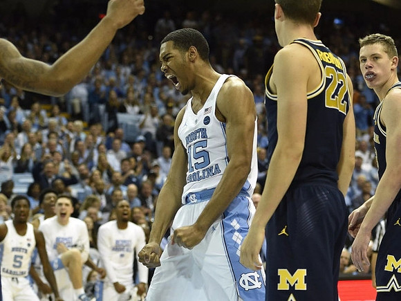 Duncan Robinson (22) and Moritz Wagner (13)
