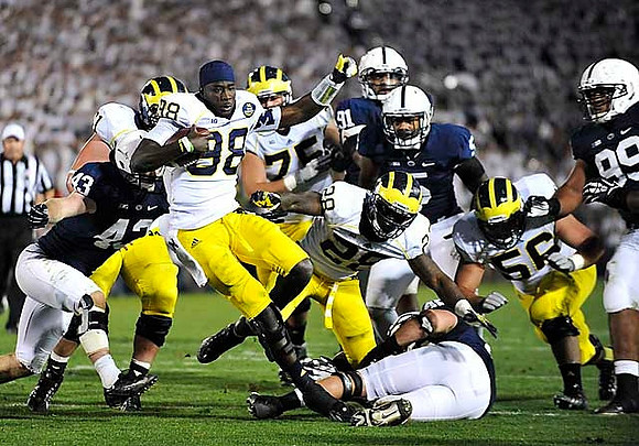 Devin Gardner (98), Fitzgerald Toussaint (28), Graham Glasgow (61), Michael Schofield (75), and Chris Bryant (58)