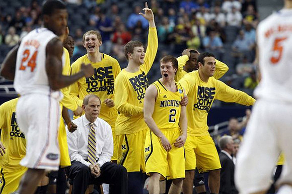 John Beilein, Blake McLimans (22), Matt Vogrich (13), Spike Albrecht (2), Josh Bartelstein (20), and Eso Akunne (5)