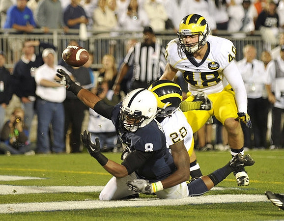 Jarrod Wilson (22) and Desmond Morgan (48)