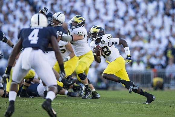 Graham Glasgow (61) and Devin Gardner (98)