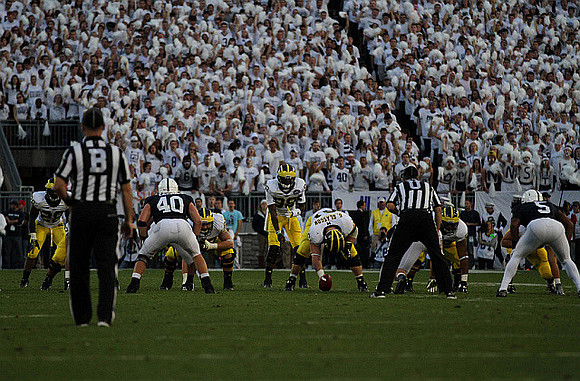 Fitzgerald Toussaint (28), Kyle Kalis (67), Graham Glasgow (61), and Devin Gardner (98)