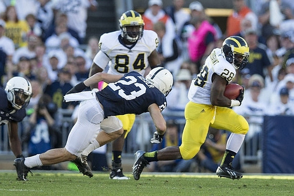 A.J. Williams (84) and Fitzgerald Toussaint (28)