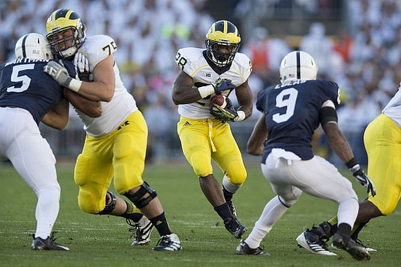 Michael Schofield (75) and Fitzgerald Toussaint (28)