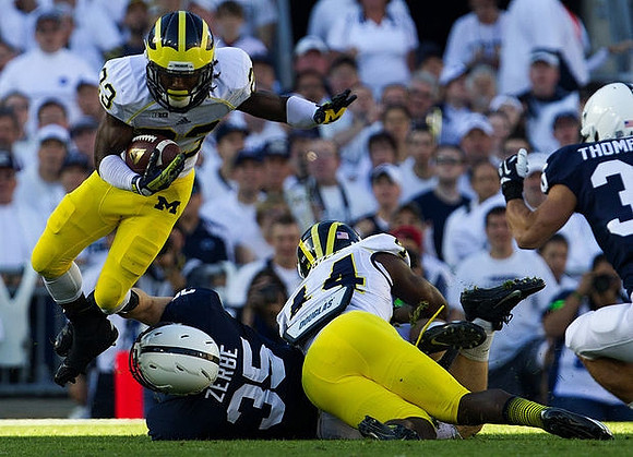 Dennis Norfleet (23) and Delano Hill (44)