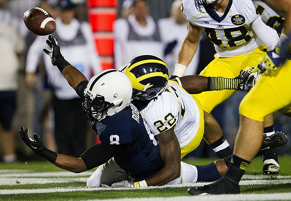 Jarrod Wilson (22) and Desmond Morgan (48)