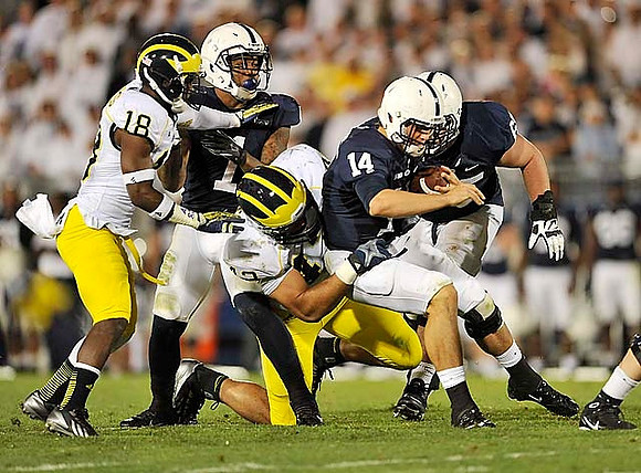 Blake Countess (18) and Chris Wormley (43)
