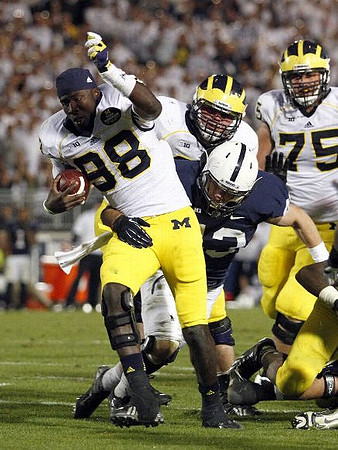 Devin Gardner (98) and Michael Schofield (75)