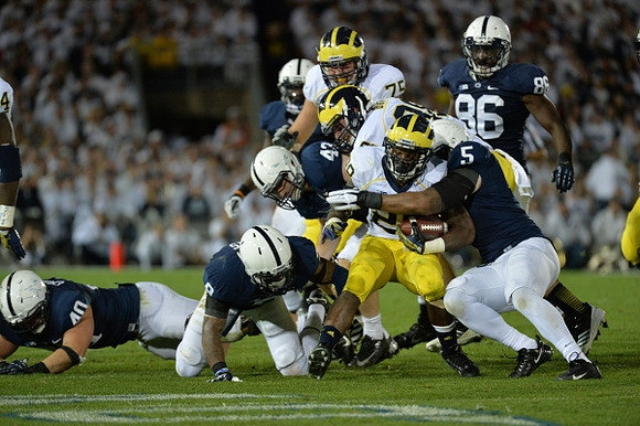 Michael Schofield (75) and Fitzgerald Toussaint (28)