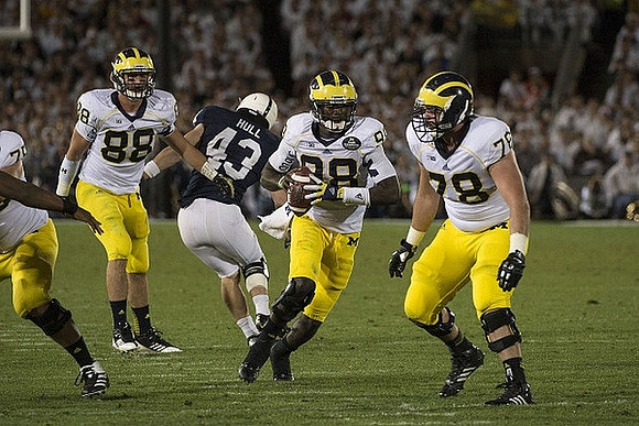Jake Butt (88), Devin Gardner (98), and Erik Magnuson (78)