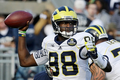 Devin Gardner (98) and Taylor Lewan (77)