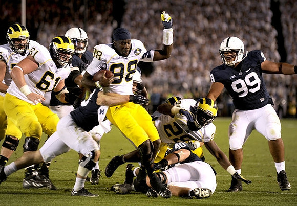 Graham Glasgow (61), Devin Gardner (98), and Fitzgerald Toussaint (28)