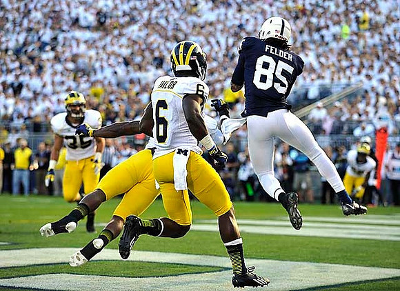 Raymon Taylor (6) and Joe Bolden (35)