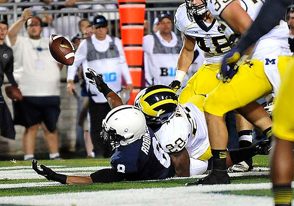 Jarrod Wilson (22) and Desmond Morgan (48)