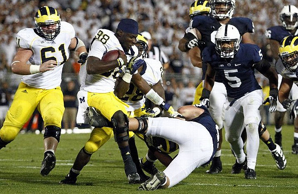 Graham Glasgow (61), Devin Gardner (98), and Fitzgerald Toussaint (28)