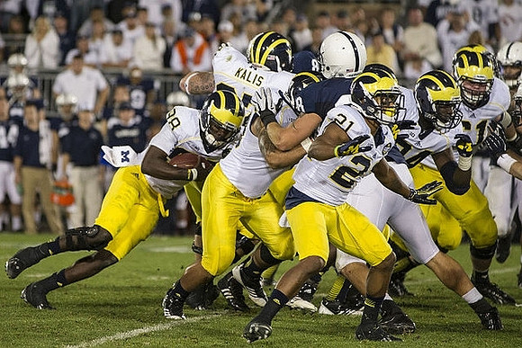 Fitzgerald Toussaint (28), Kyle Kalis (67), Jeremy Gallon (21), A.J. Williams (84), and Graham Glasgow (61)