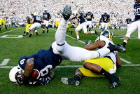 Jeremy Gallon (21), Fitzgerald Toussaint (28), Kyle Kalis (67), and Graham Glasgow (61)