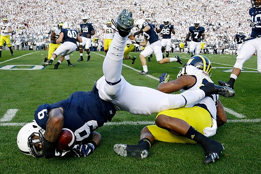 Jeremy Gallon (21), Fitzgerald Toussaint (28), Kyle Kalis (67), and Graham Glasgow (61)