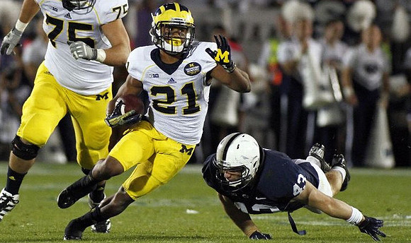Michael Schofield (75) and Jeremy Gallon (21)
