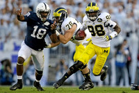 Erik Magnuson (78) and Devin Gardner (98)