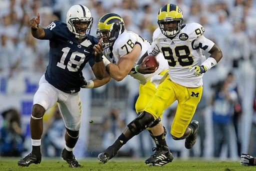 Erik Magnuson (78) and Devin Gardner (98)