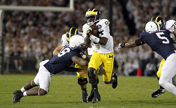 Devin Gardner (98) and Michael Schofield (75)