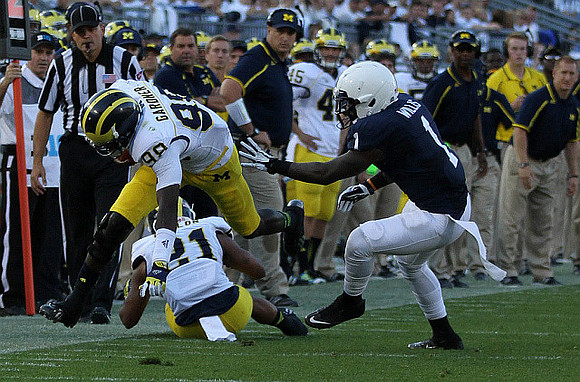 Jeremy Gallon (21) and Devin Gardner (98)