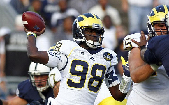 Devin Gardner (98) and Michael Schofield (75)