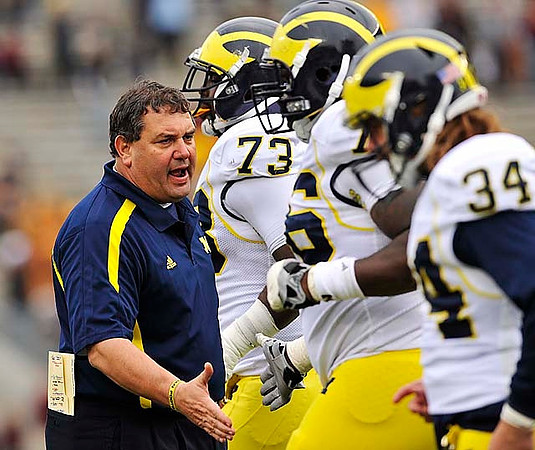 Brady Hoke, William Campbell (73), Quinton Washington (76), and Brendan Gibbons (34)