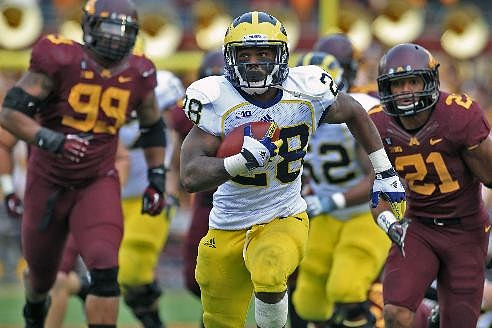 Fitzgerald Toussaint (28) and Ricky Barnum (52)