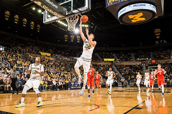 Muhammad-Ali Abdur-Rahkman (12), Duncan Robinson (22), Zak Irvin (21), Spike Albrecht (2), and Caris LeVert (23)