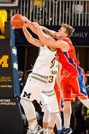 Duncan Robinson (22) and Moritz Wagner (13)