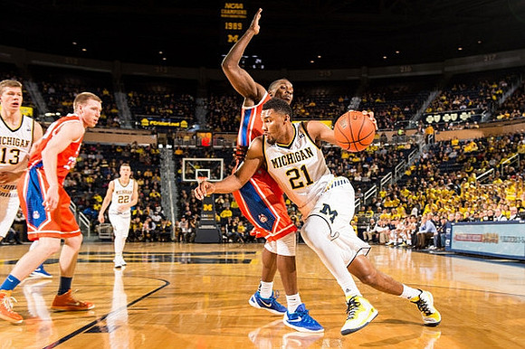 Moritz Wagner (13), Duncan Robinson (22), and Zak Irvin (21)