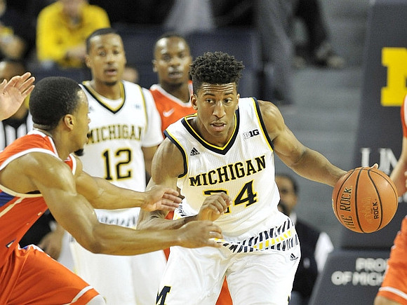 Muhammad-Ali Abdur-Rahkman (12) and Aubrey Dawkins (24)