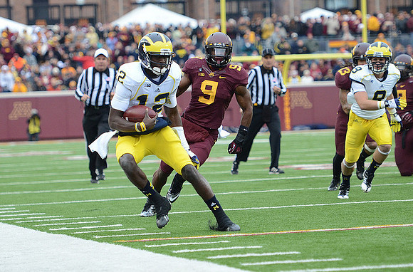 Devin Gardner (12) and Drew Dileo (9)