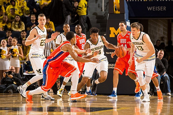 Duncan Robinson (22), Muhammad-Ali Abdur-Rahkman (12), Aubrey Dawkins (24), and Moritz Wagner (13)