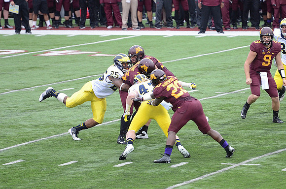 Kenny Demens (25) and Jake Ryan (47)